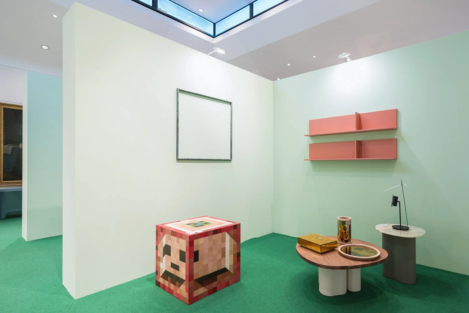 Minimalist art gallery interior with pastel walls, a pixelated dog sculpture, abstract tables, and modern shelving and lighting.