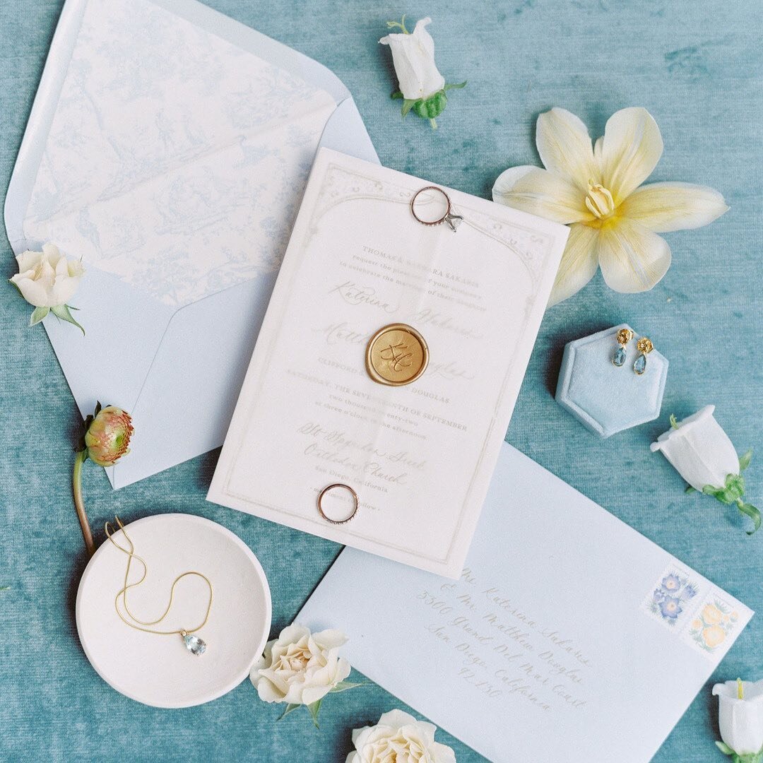 This Invitation Suite was heavily inspired by the Bride's Dress. I designed 3 color letterpress elements to coordinate with the lovely embroidery of the gown by @costarellos⁠. There were so many other fun details, like tiny kitties hidden in the cust