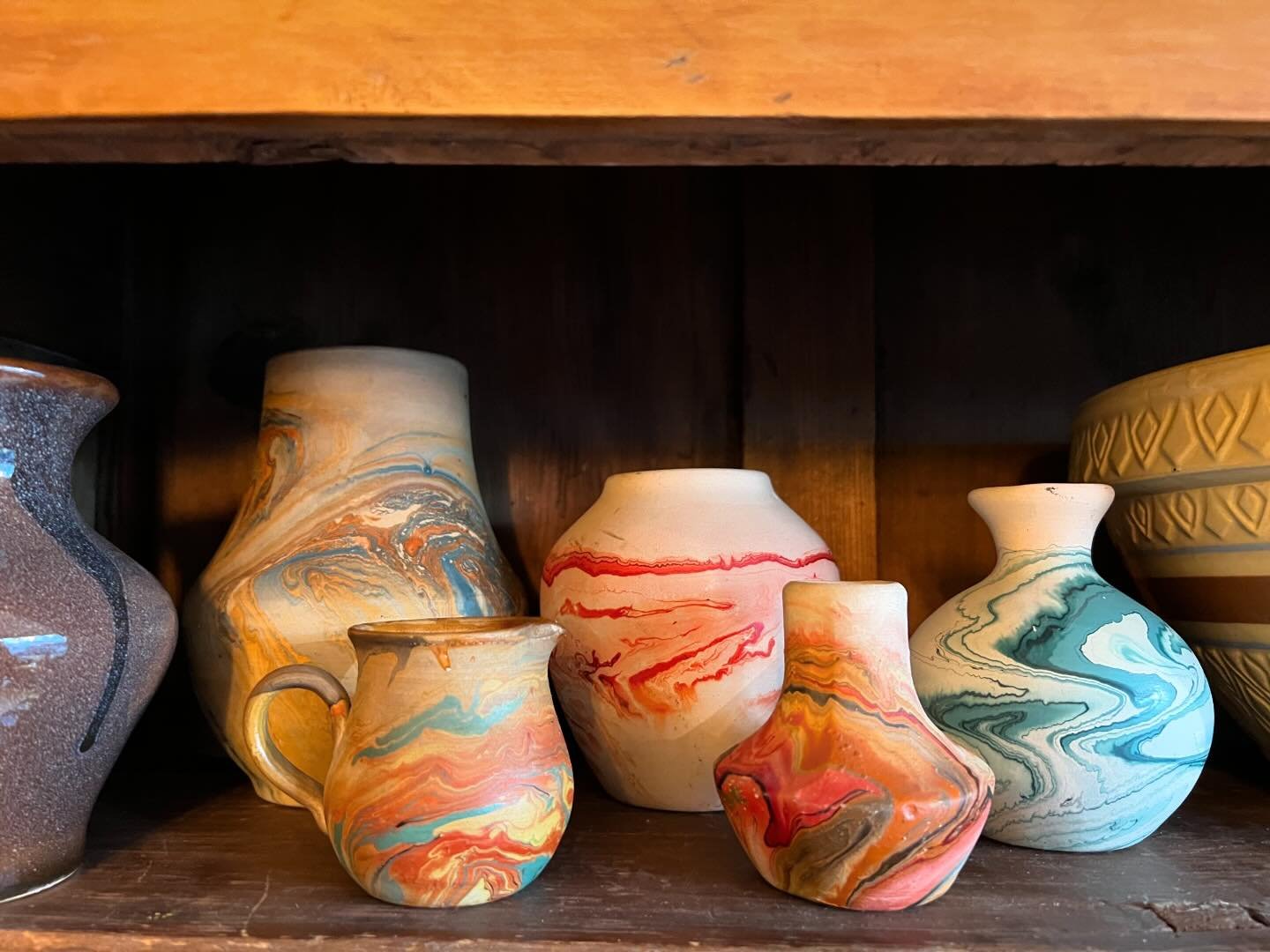 Nemadji pottery.  So beautiful! Nemadji pottery comes from the Arrowhead region of Minnesota. It has never actually been made by native Americans, but is said to be reminiscent of the style and colouring used by them. It has come to be thought of by 