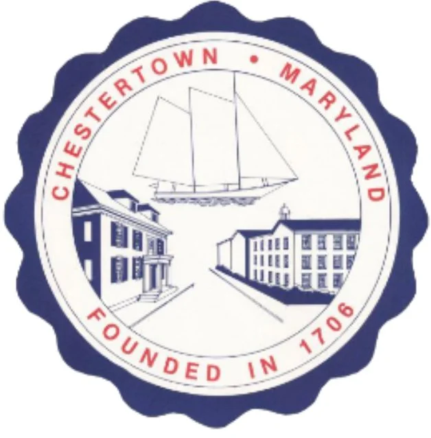 chestertown maryland city seal with a tall ship and colonial buildings