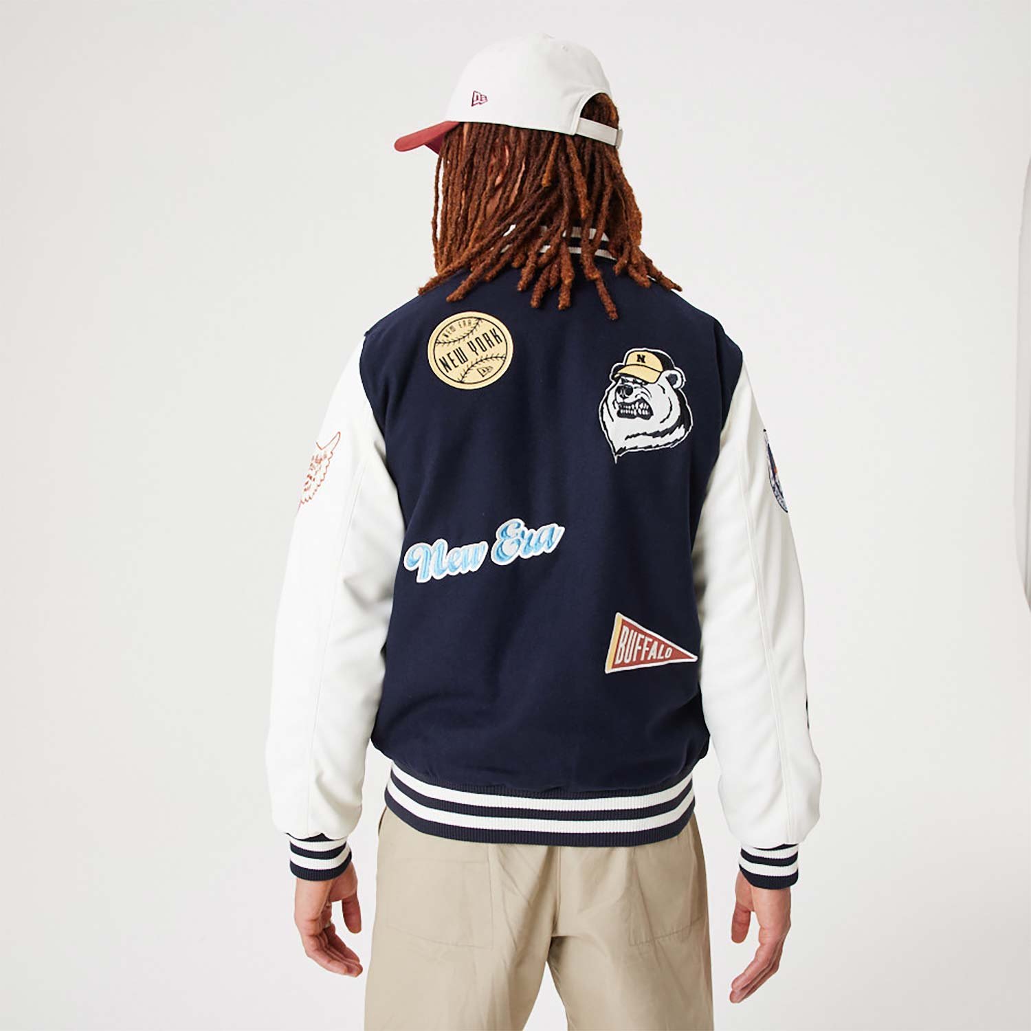 new-era-heritage-all-over-patch-navy-varsity-jacket-60332225-center.jpg