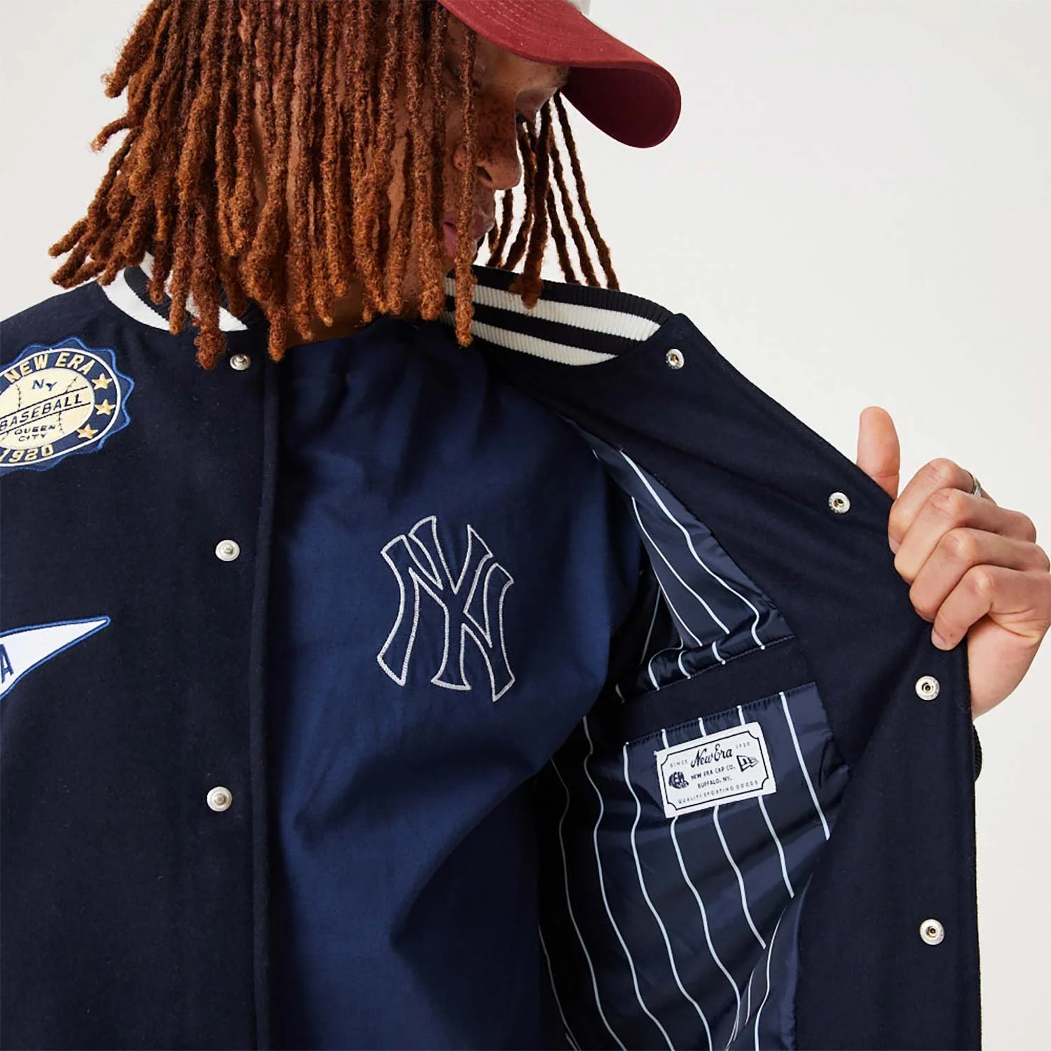new-era-heritage-all-over-patch-navy-varsity-jacket-60332225-7.jpg