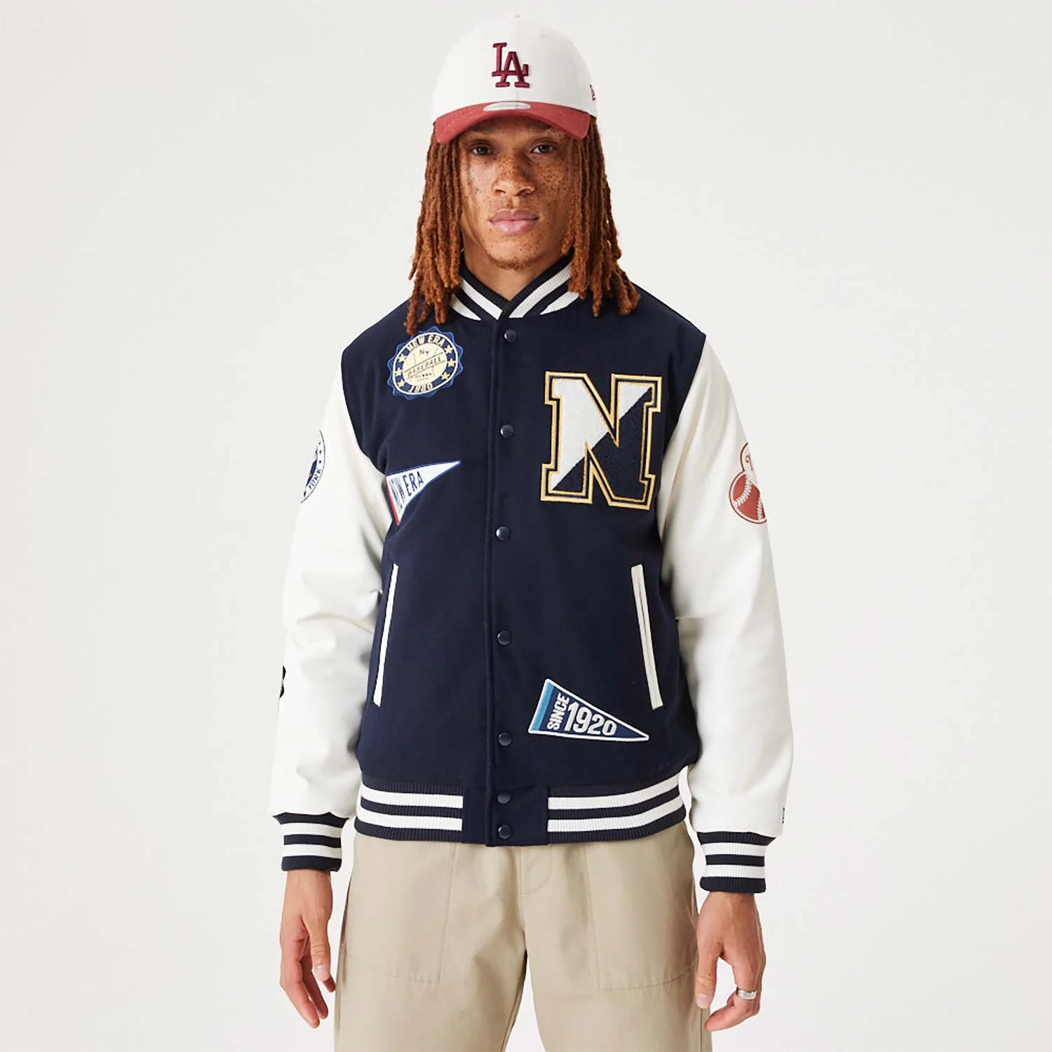 new-era-heritage-all-over-patch-navy-varsity-jacket-60332225-left.jpg