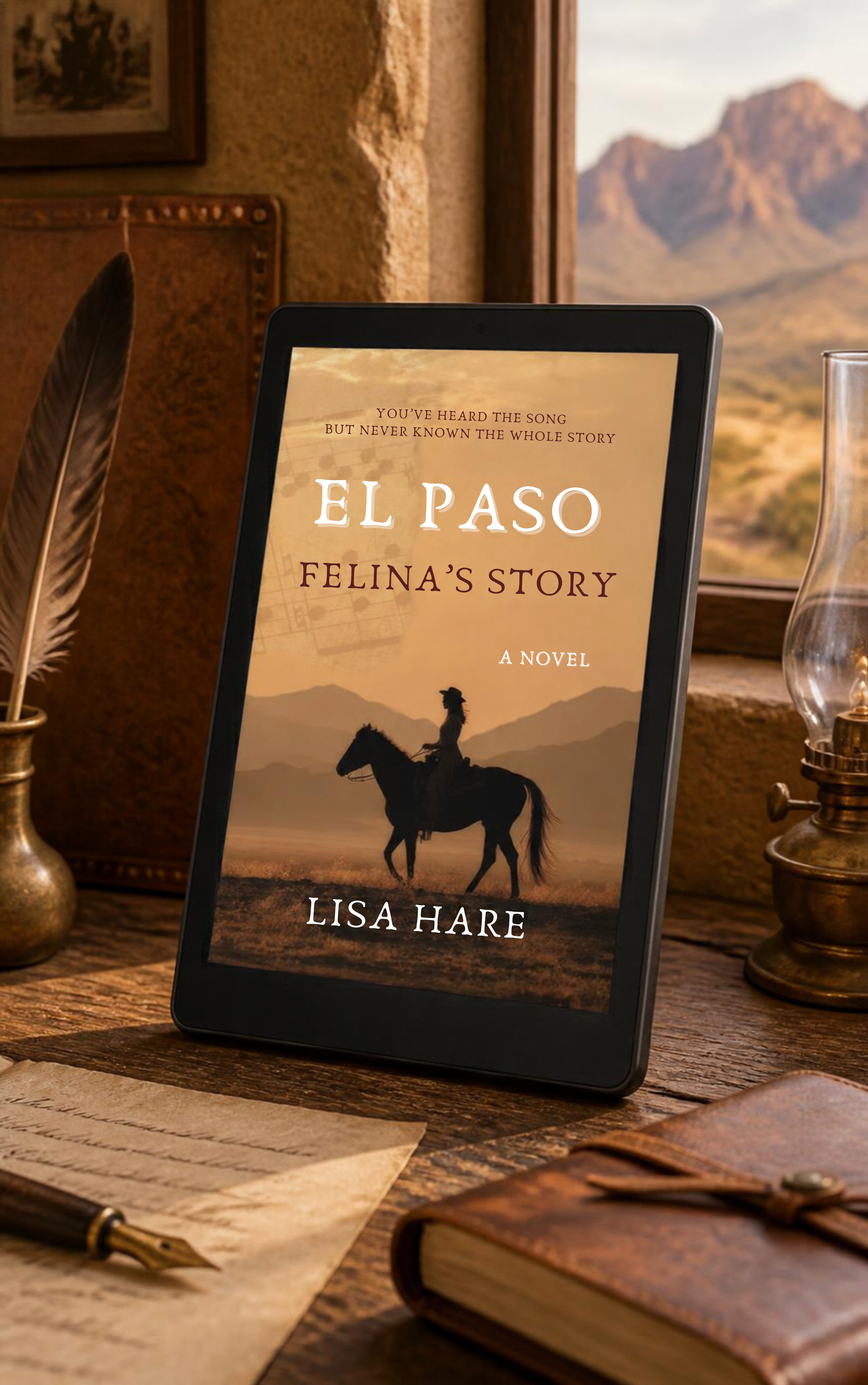 The image shows a book titled 'El Paso: Felina's Story' by Lisa Hare on a wooden table. The book cover features a silhouette of a woman riding a horse in a desert landscape with mountains in the background during sunset. There is also a vintage oil lamp, a feather quill, a notebook, and a paper with writing on the table.