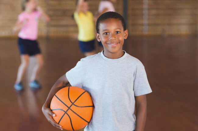 Black boy with basketball.jpeg