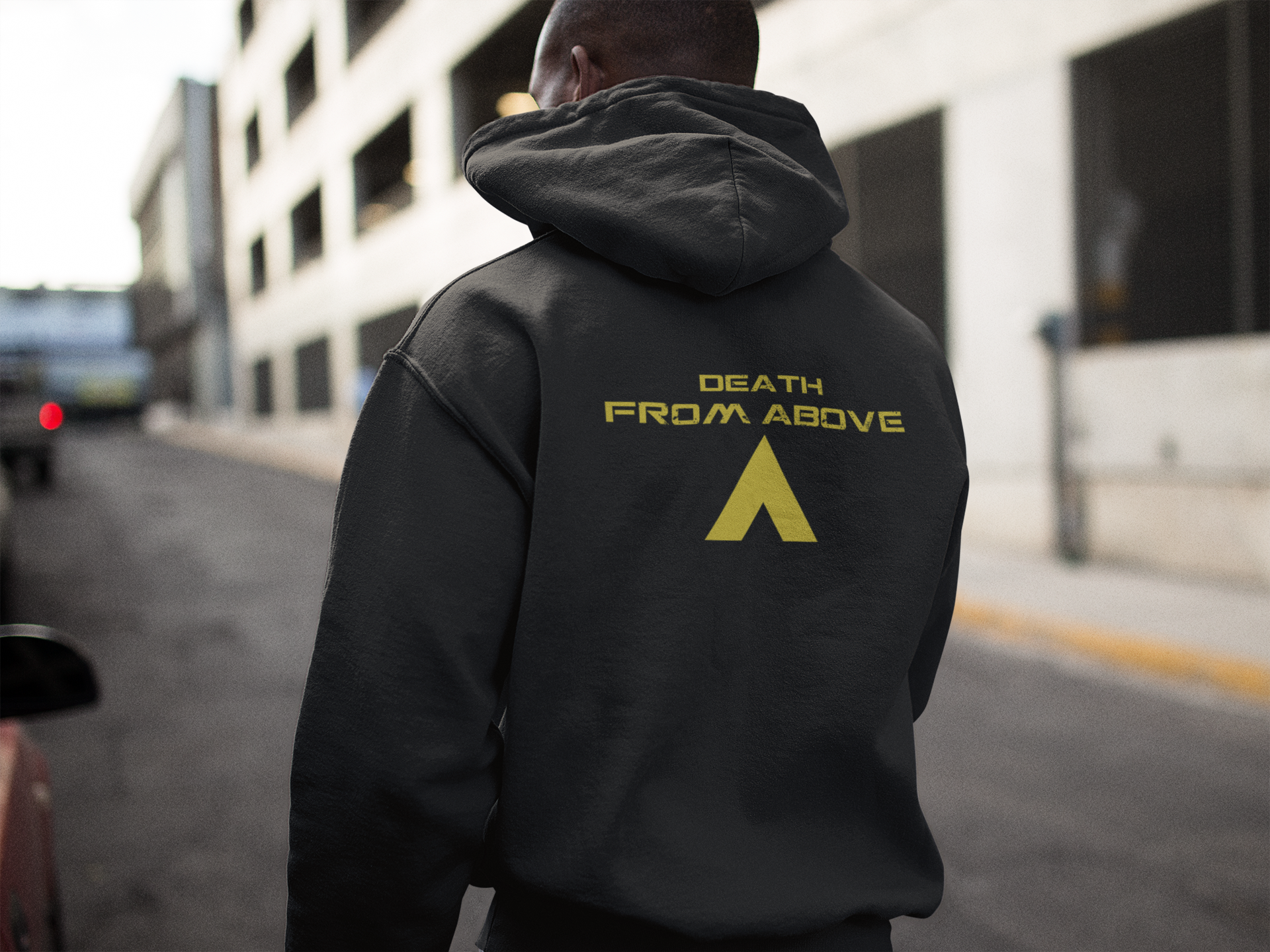 back-side-hoodie-mockup-of-a-man-walking-down-a-street-b12553.png