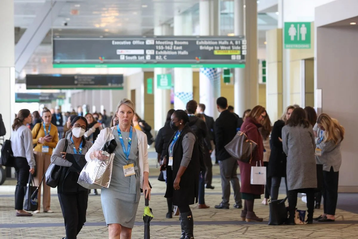 guests walking in the halls at the Boston Convention and Exhibition Center