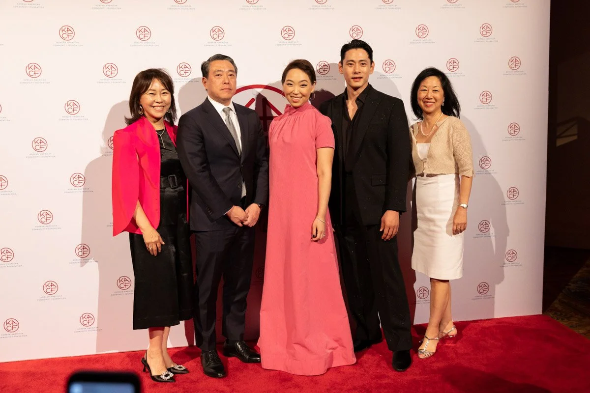 KACF Gala guests posing for a group photo on the red carpet at Cipriani Downtown Manhattan