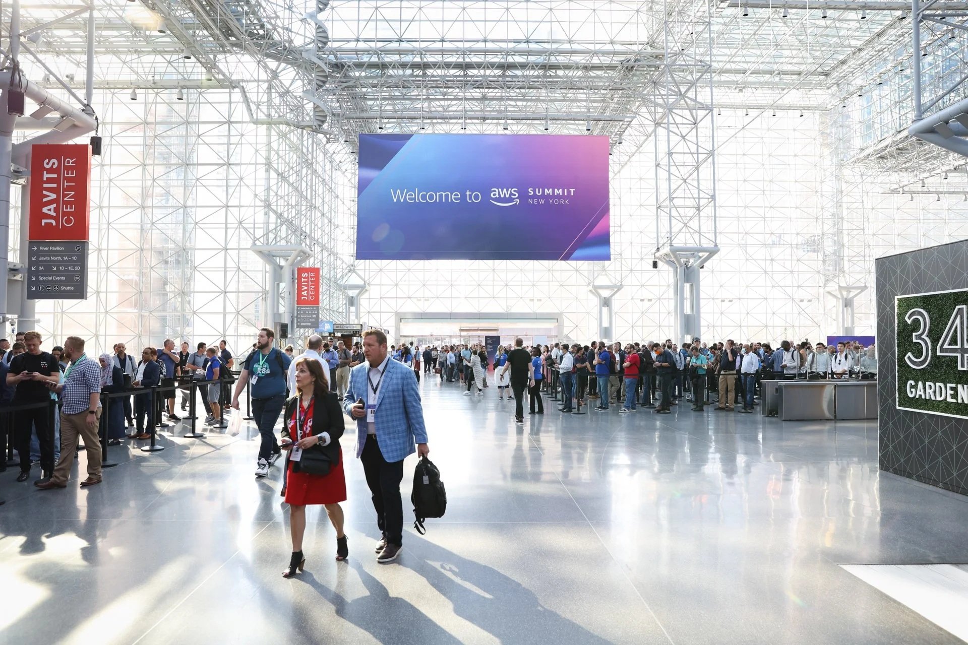 attendees walking in exhibition hall at the javits center in new york city
