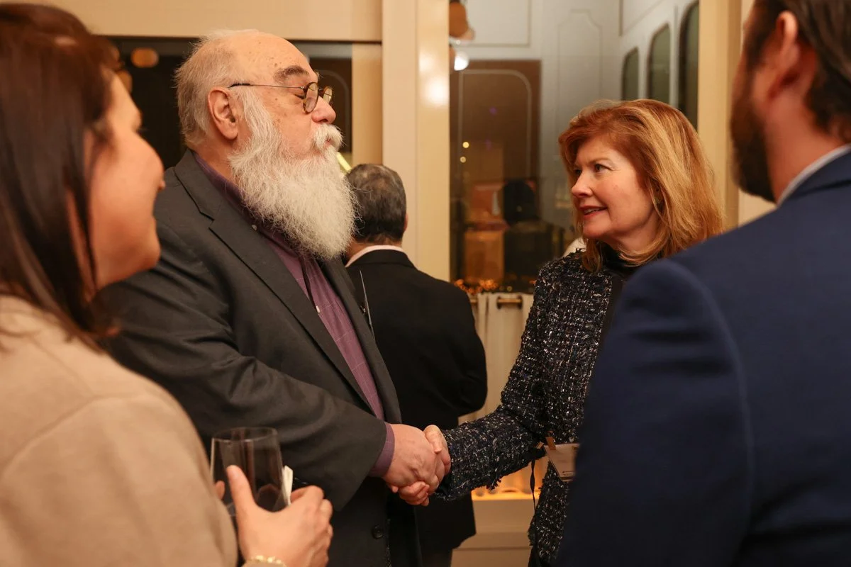 business executives shaking hands in new york city