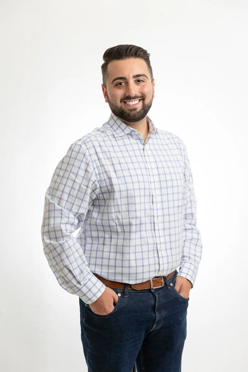 Professional business headshot in a Manhattan office