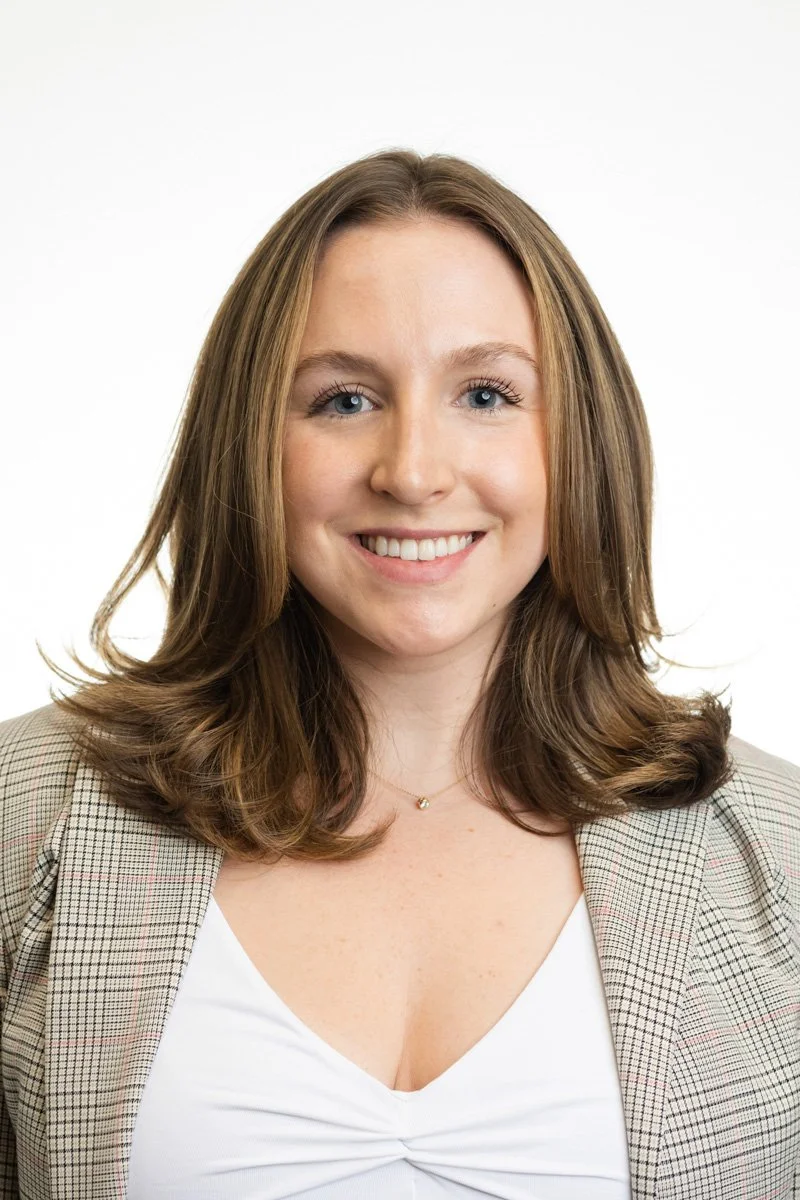 Corporate staff headshot of a woman photographed on location in NYC