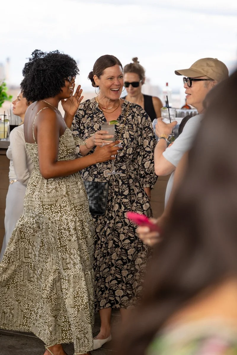female executives networking at rooftop venue in nyc