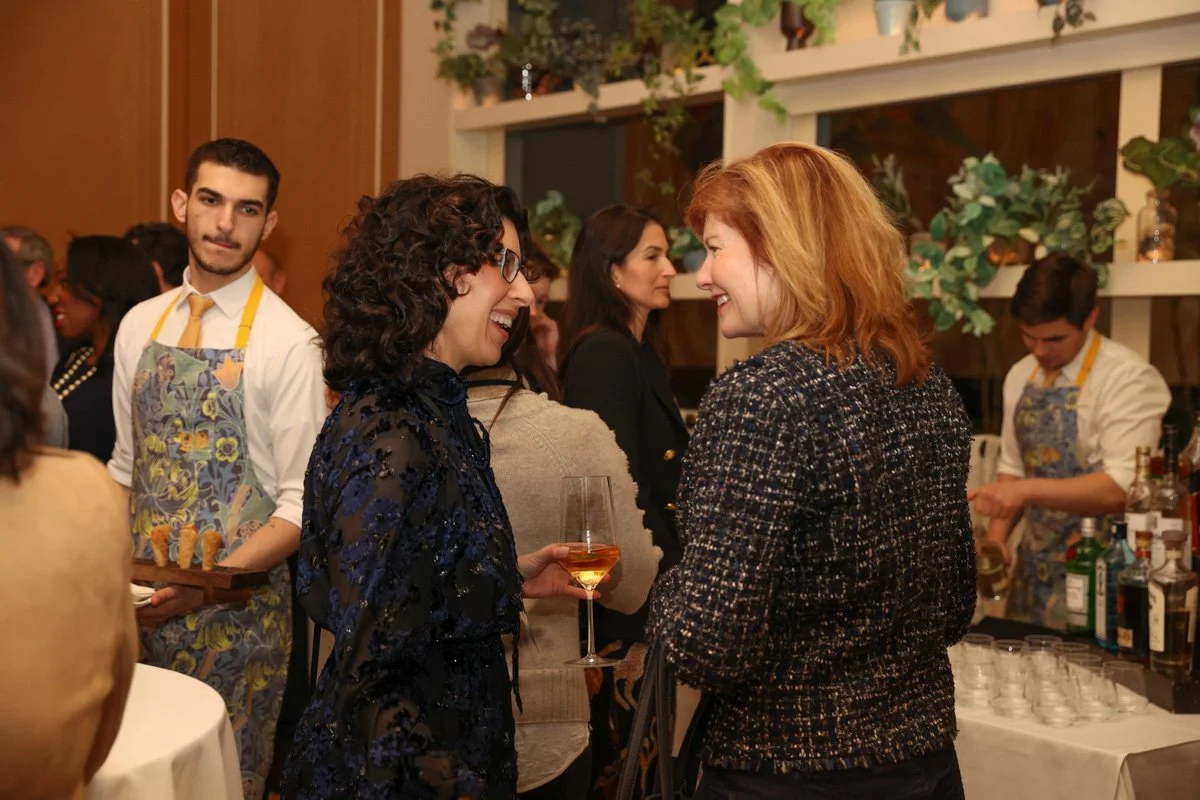 female executives networking in corporate reception in nyc