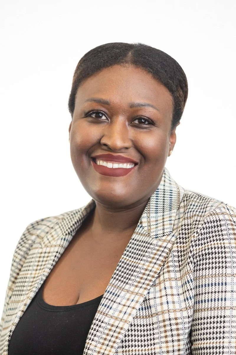 Professional corporate headshot of a woman executive photographed in New York City