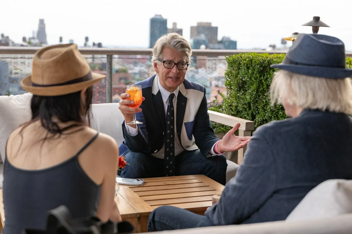 business professionals networking at rooftop venue in new york city