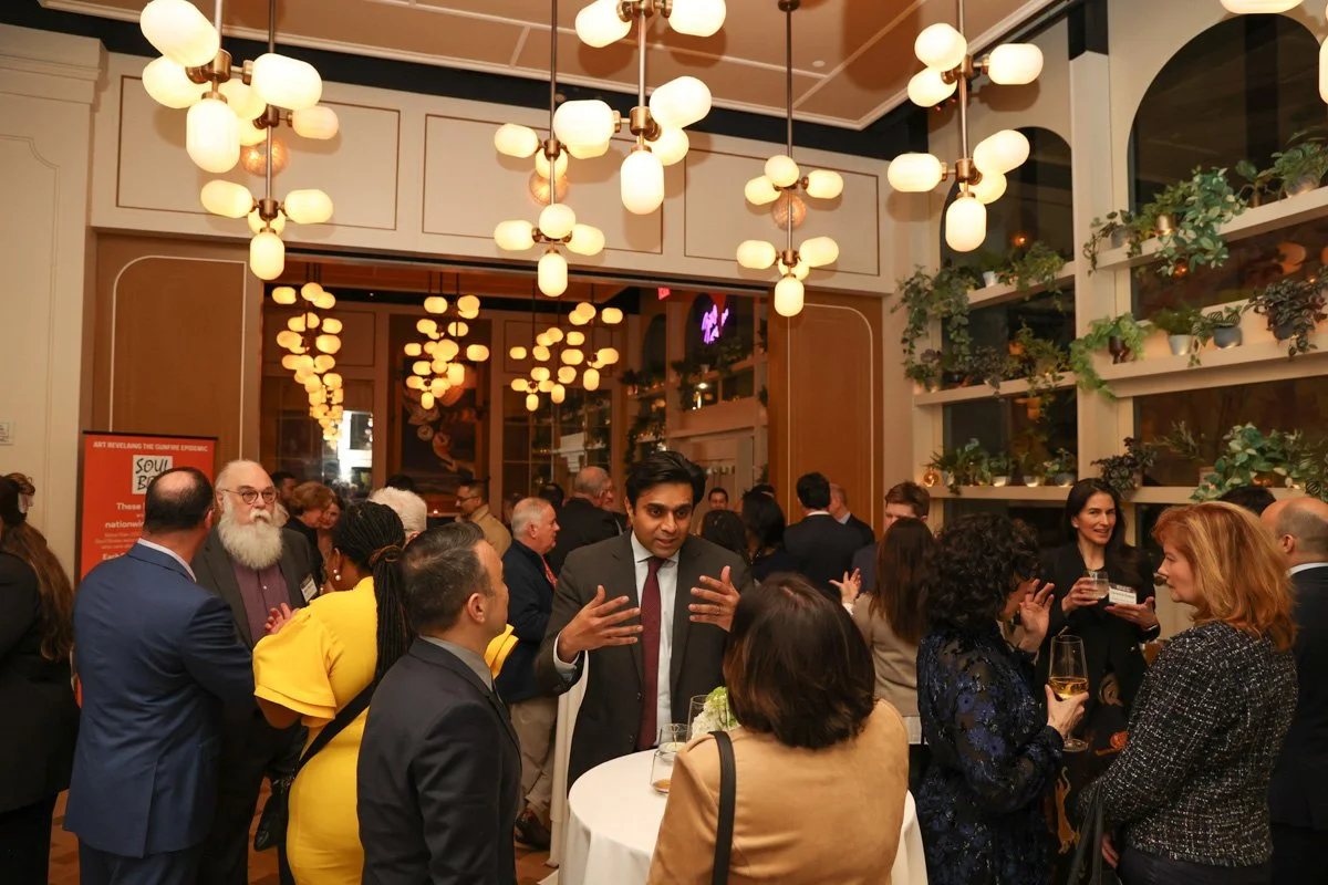 executives networking in corporate reception in nyc