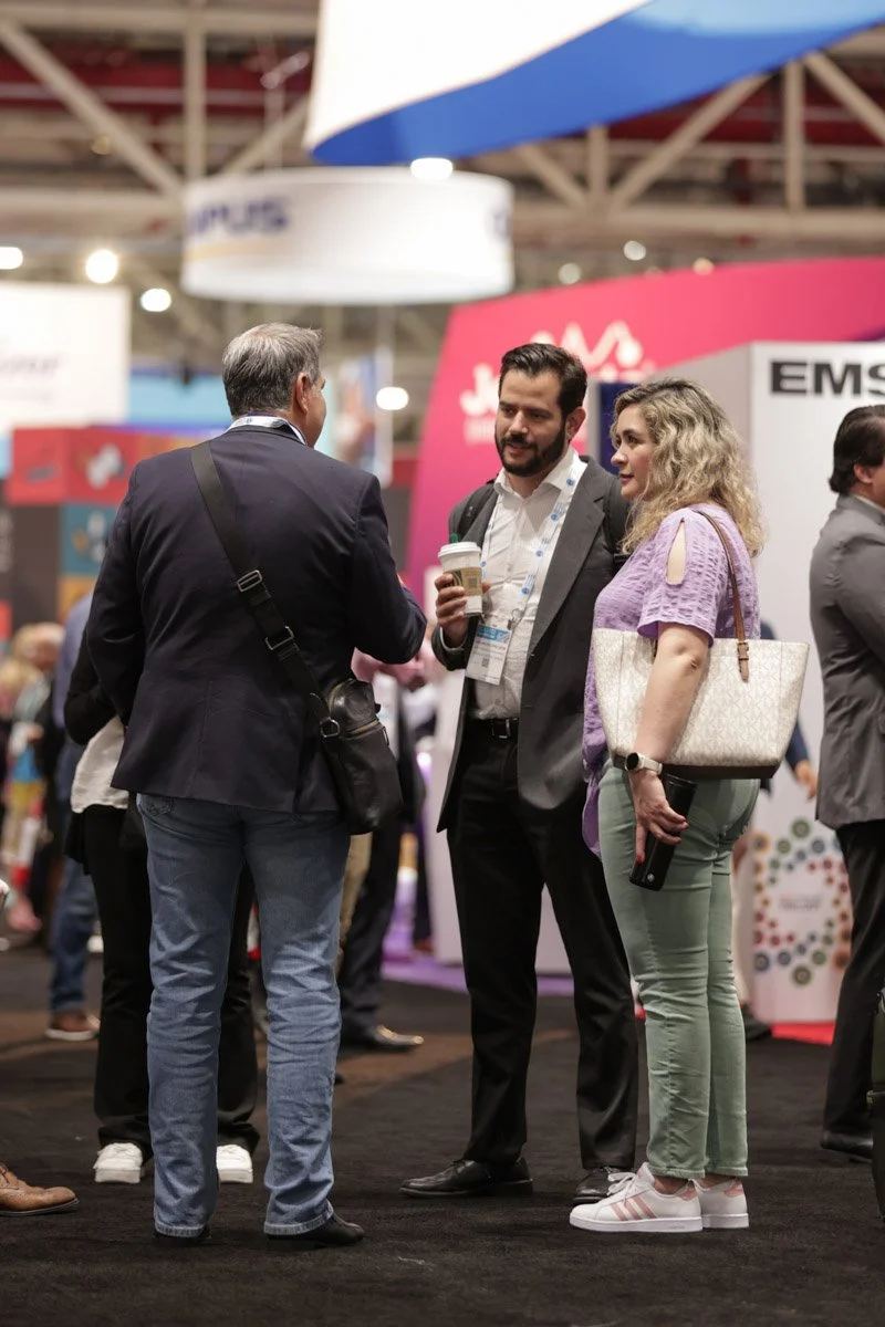 guests interacting in exhibit booths at the American Urological Association Meeting in the New Orleans Ernest N. Morial Convention Center 
