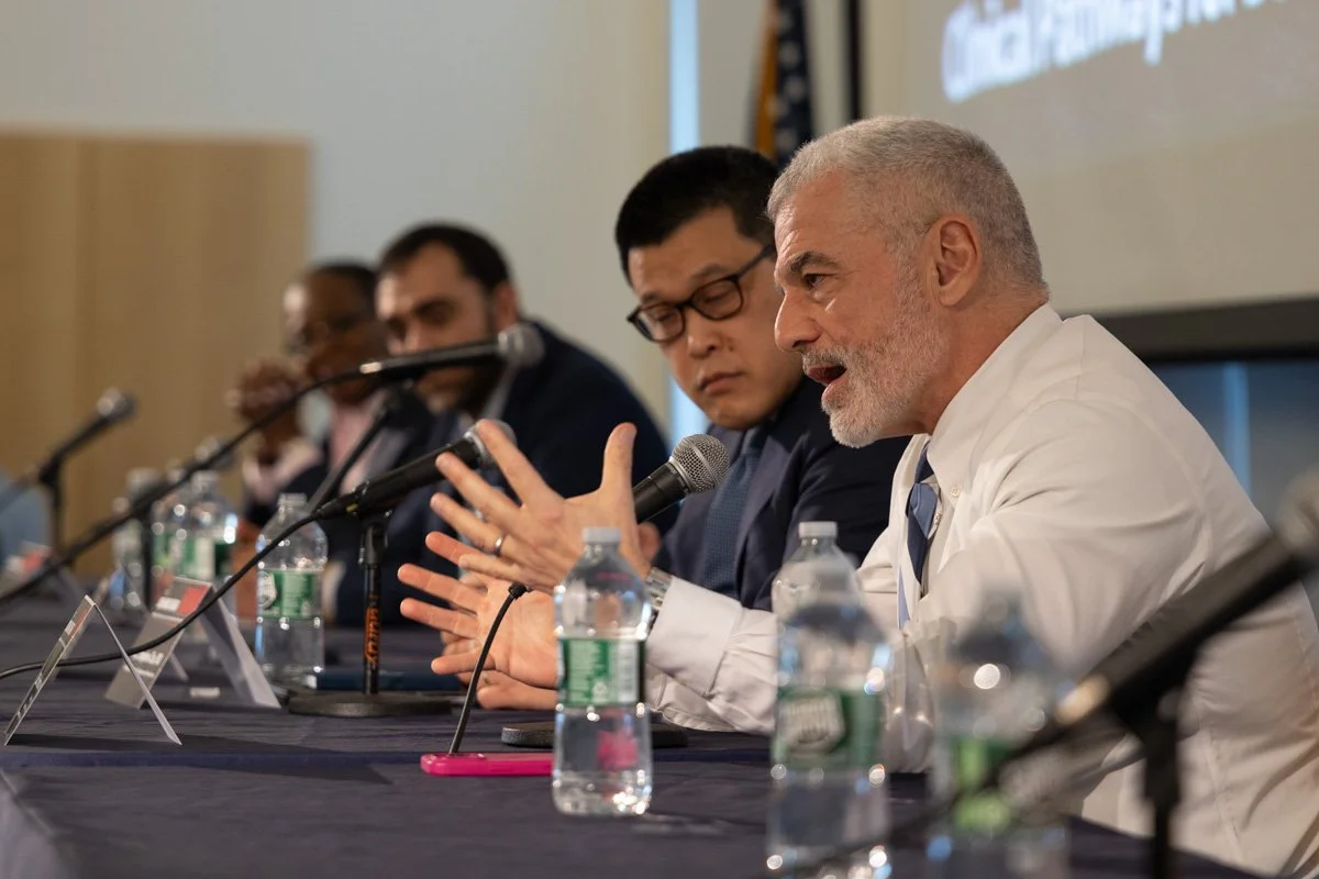 speaker speaking at a panel at a nonprofit conference
