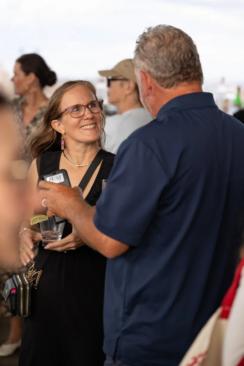 business professionals networking at rooftop venue in nyc