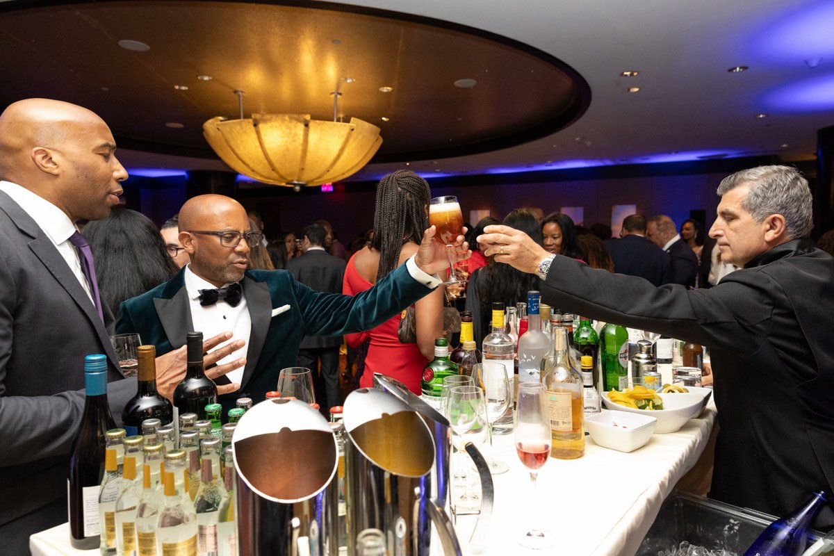 Bartender serving cocktails to guests at the CUP Gala at Mandarin Oriental in Manhattan