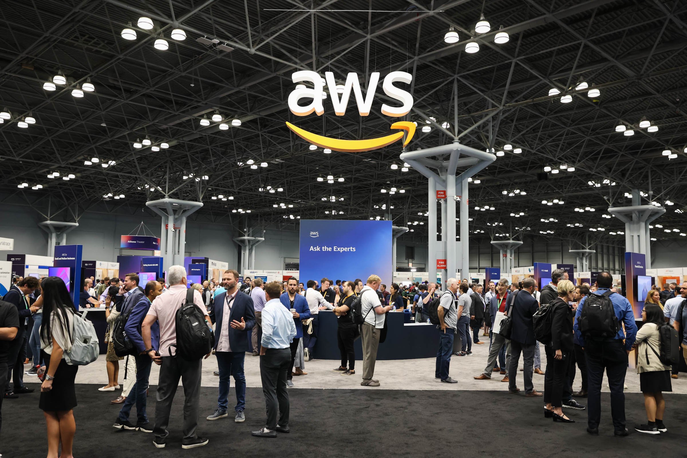 attendees walking in exhibition hall at the javits center in new york city