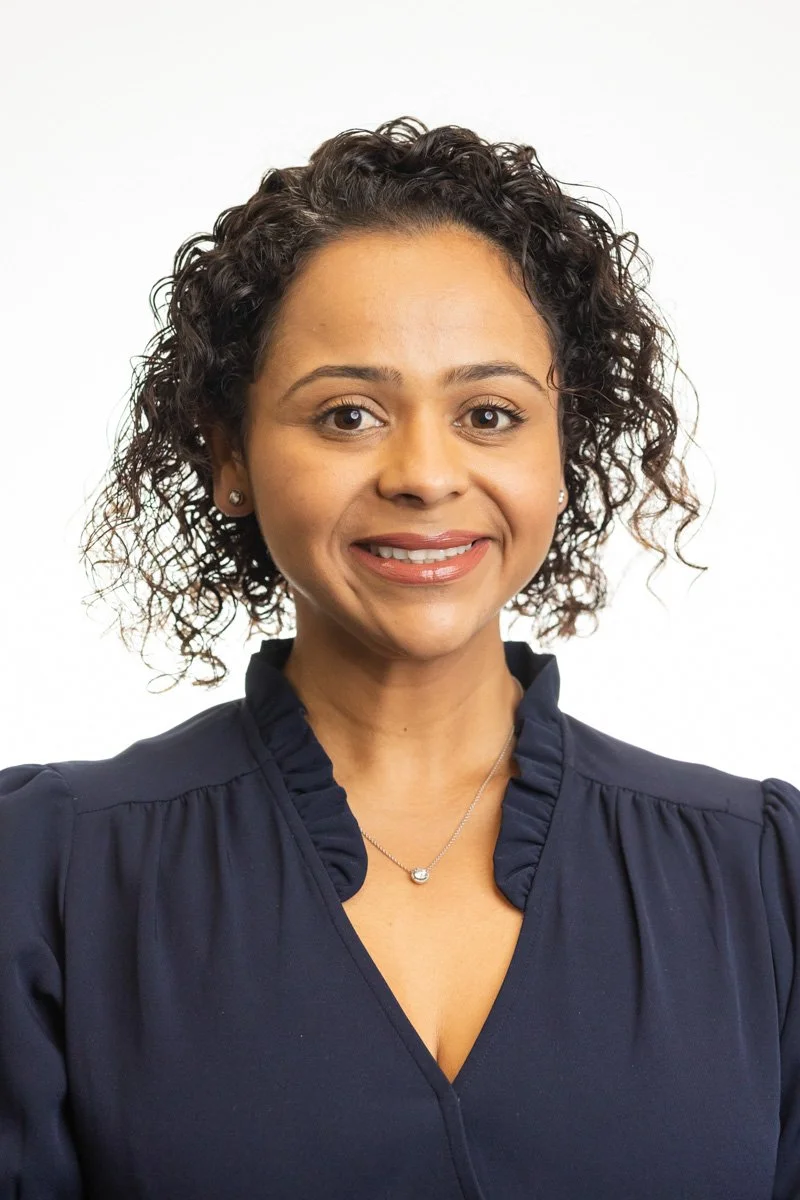 Corporate headshot portrait of a woman photographed on location in Manhattan