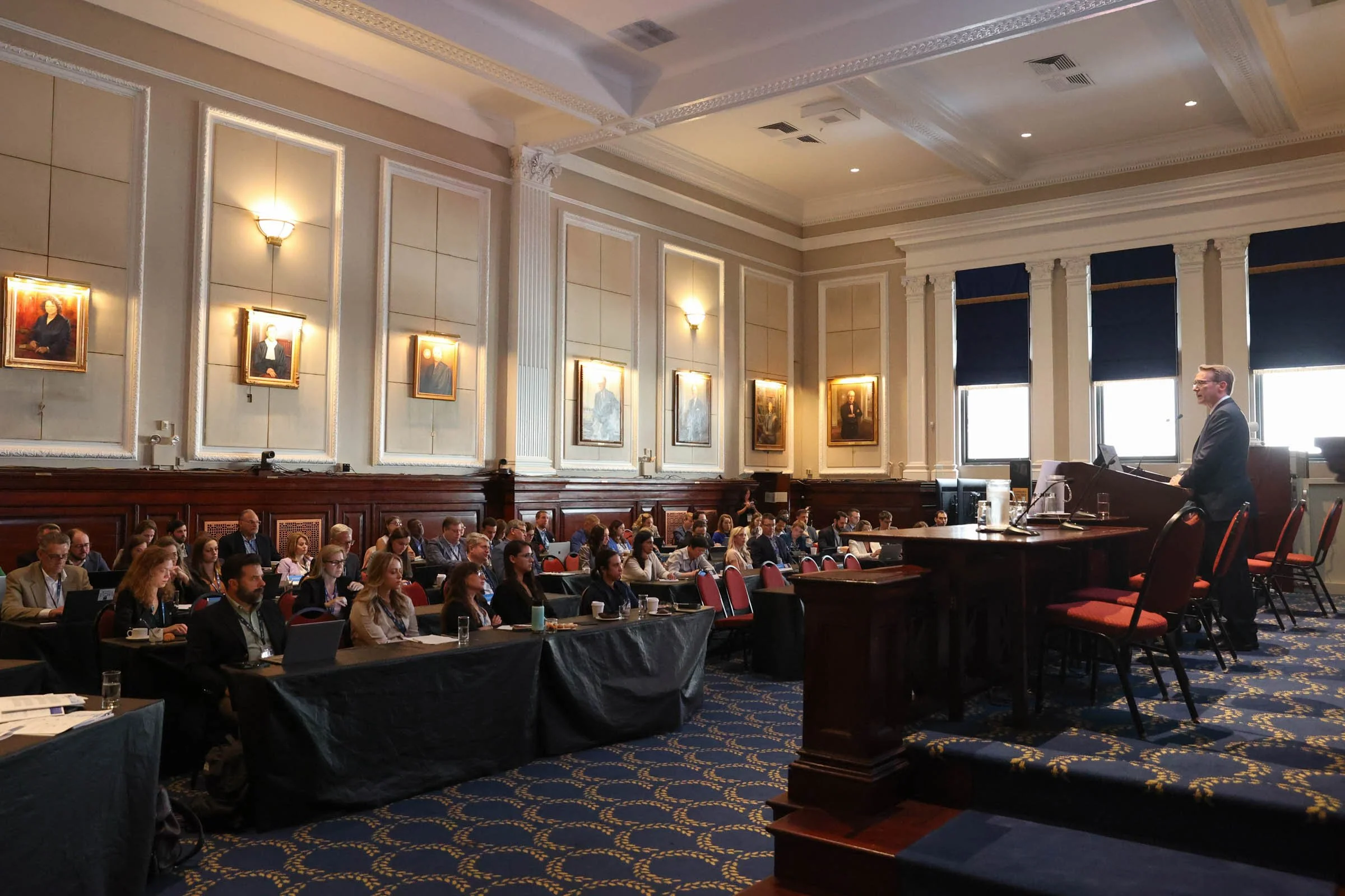 executive speaking at a legal conference in nyc