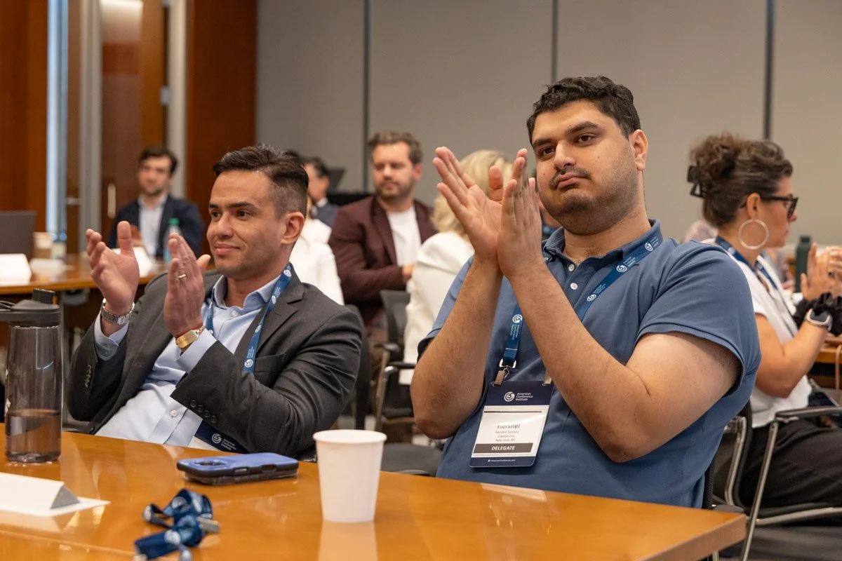 Audience applauding during a keynote presentation at ACI's Trade Compliance Tech conference in New York City.