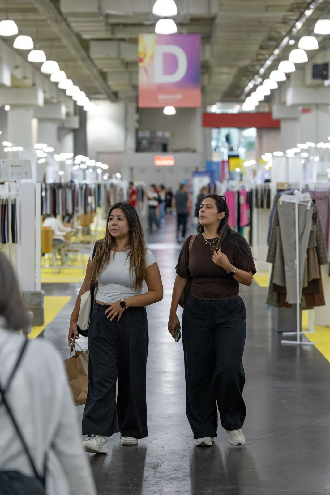 Texworld NYC textile trade show floor with busy exhibitors and attendees at Javits Center