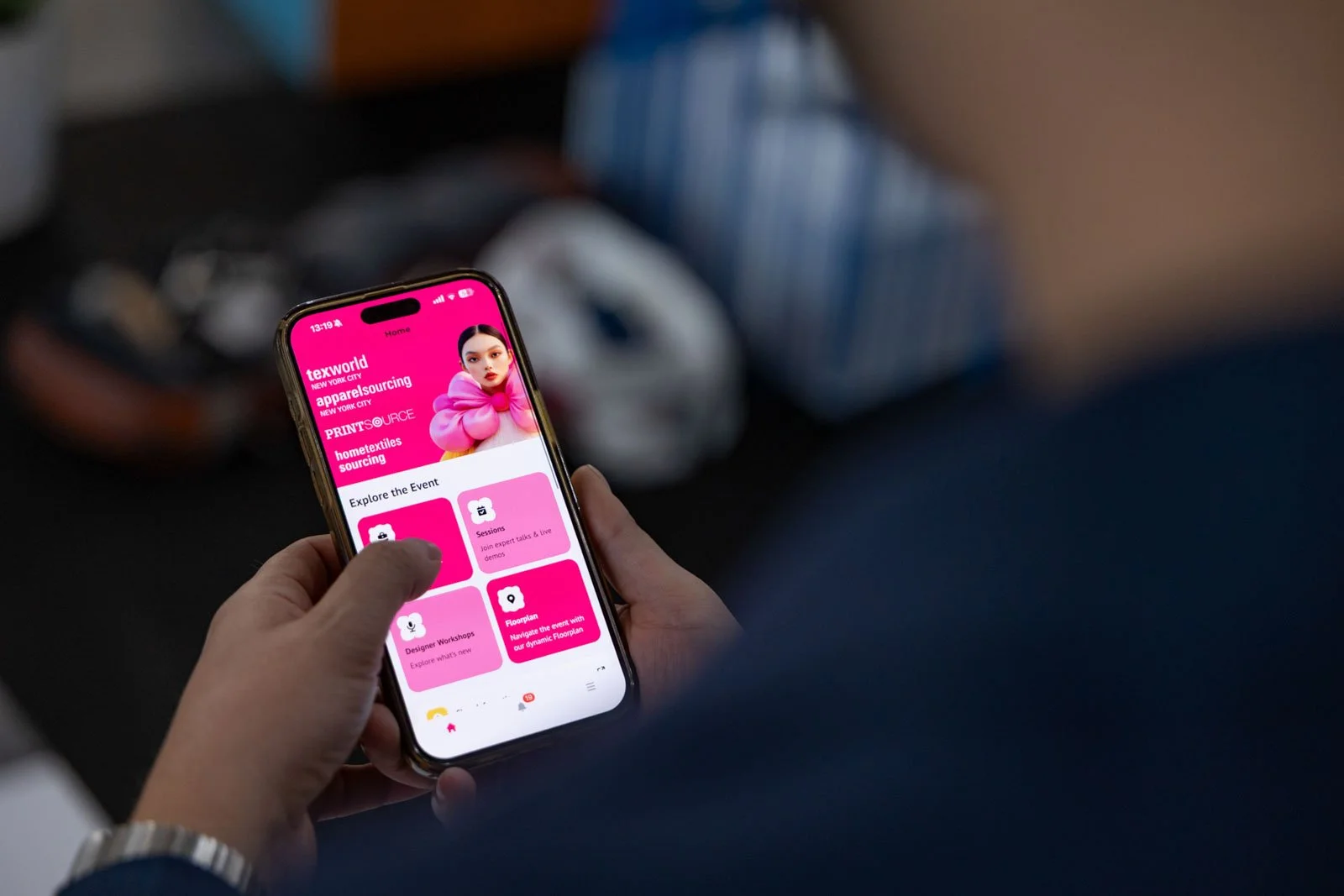 Texworld NYC attendee using event app at Javits Center