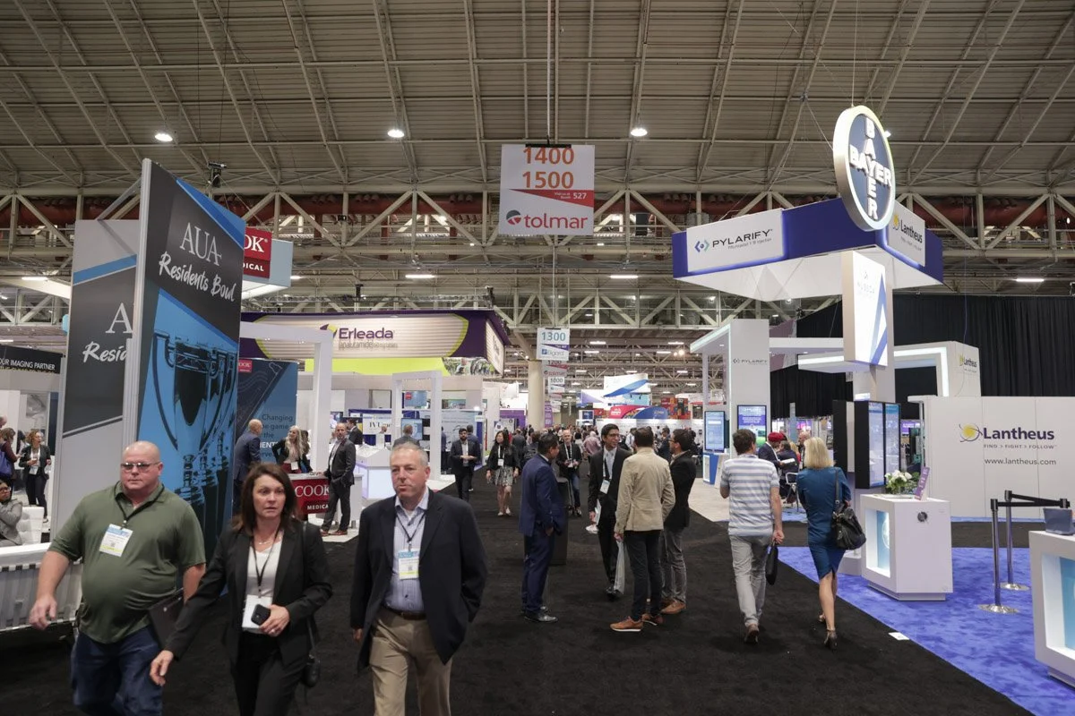 guests walking in the exhibit hall at the American Urological Association Meeting in the New Orleans Ernest N. Morial Convention Center 