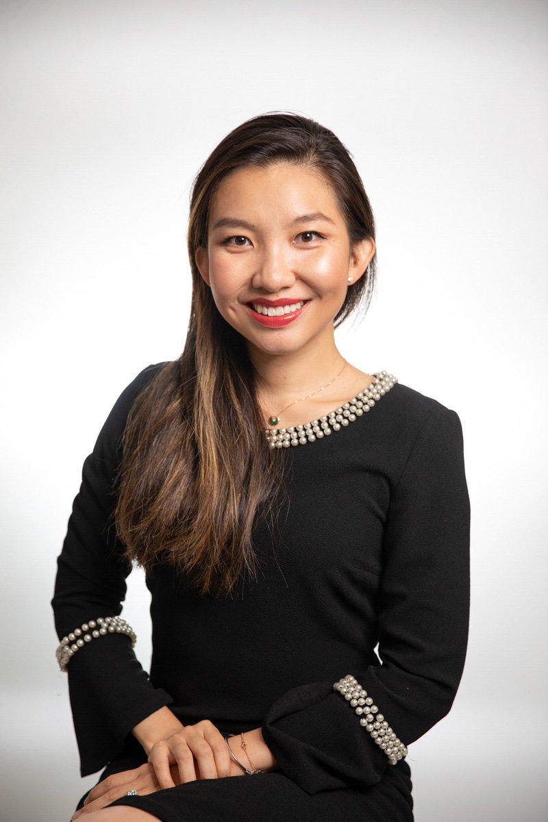 Professional corporate headshot of a woman executive photographed in New York City