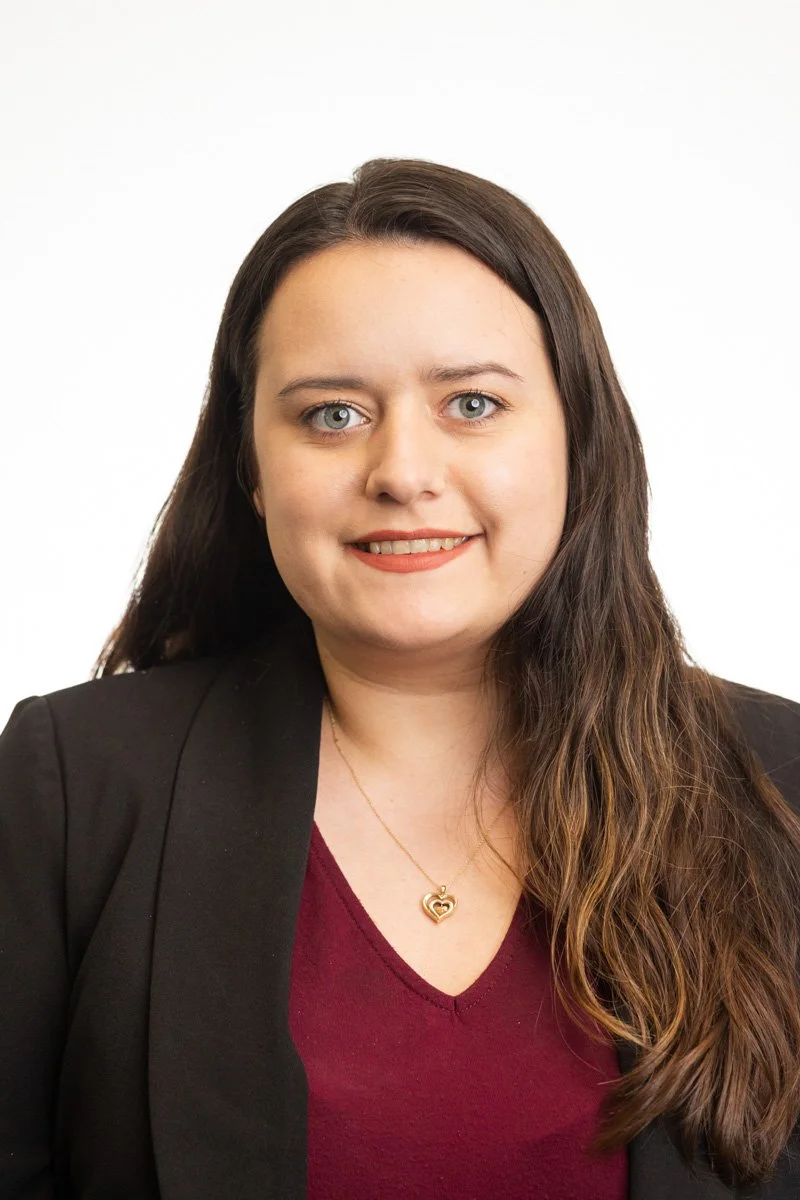 Professional corporate headshot of a woman executive photographed in New York City