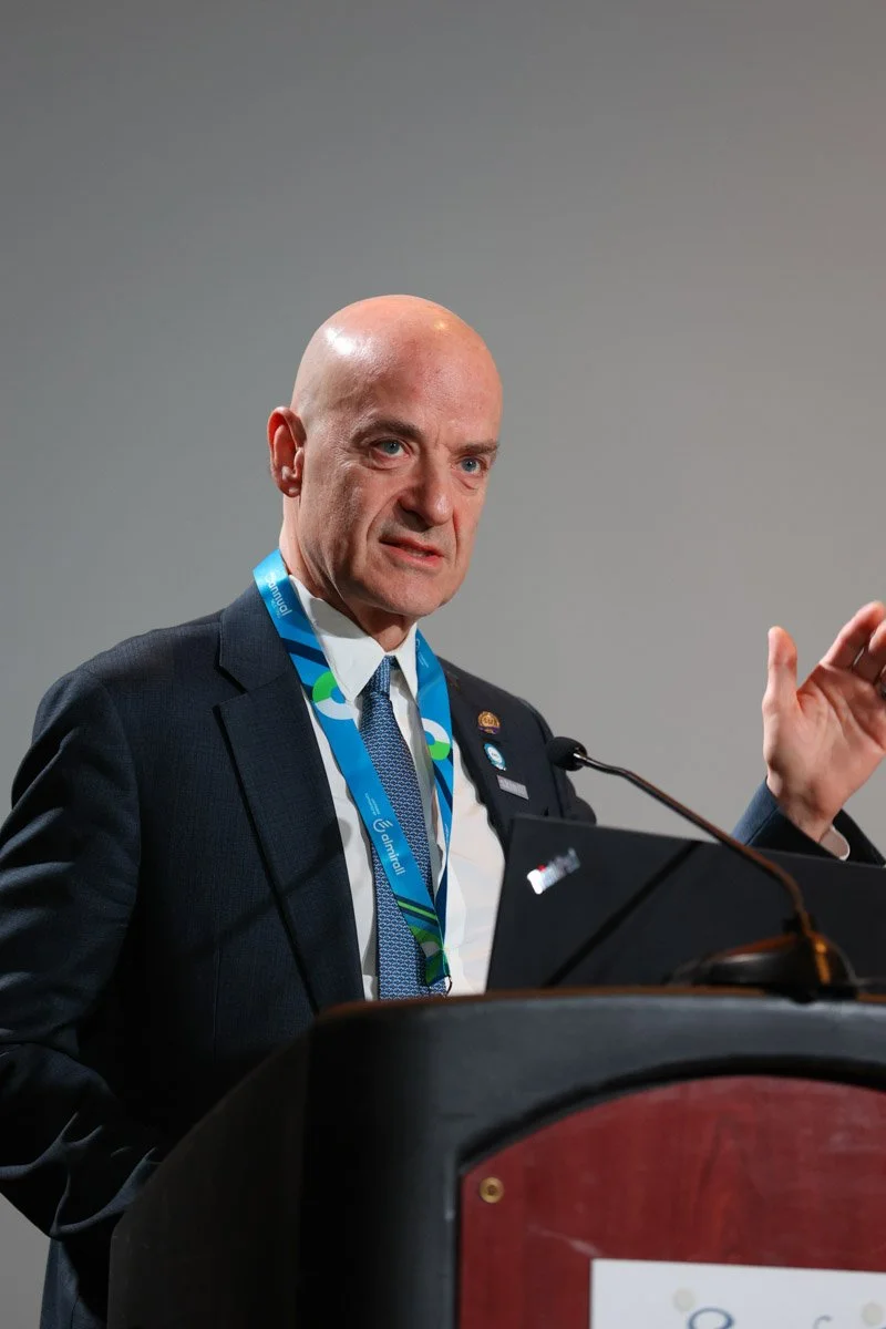 Keynote speaker presenting at a conference at the Boston Convention and Exhibition Center