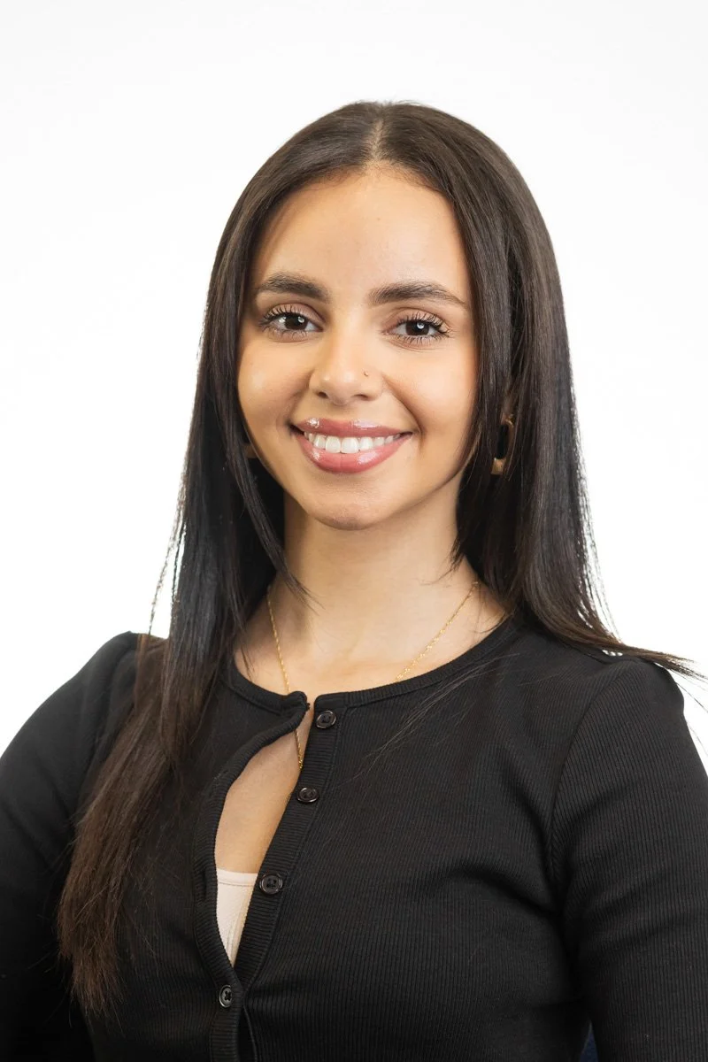 Corporate staff headshot of a woman photographed on location in NYC