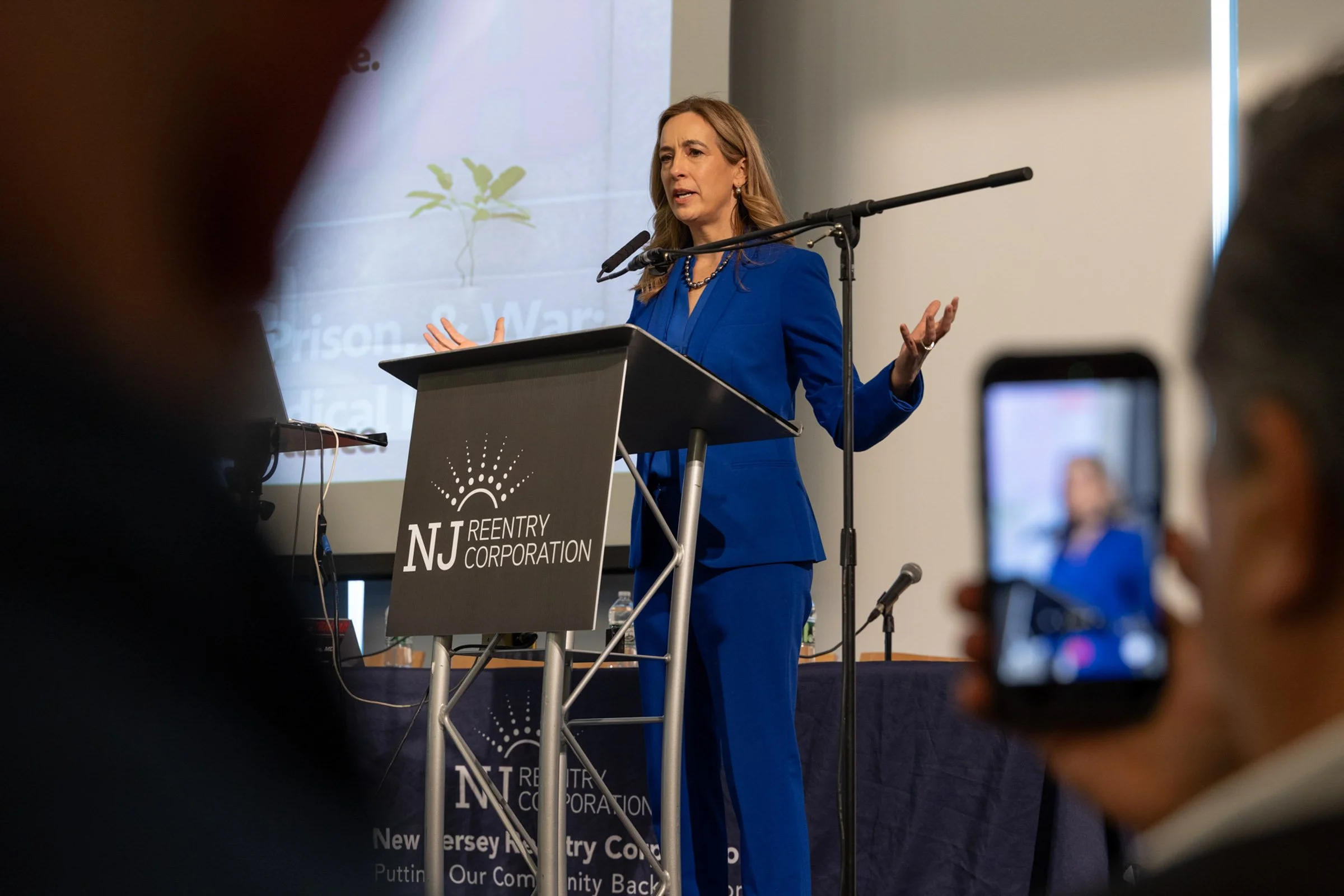 governor speaking at a nonprofit conference in manhattan