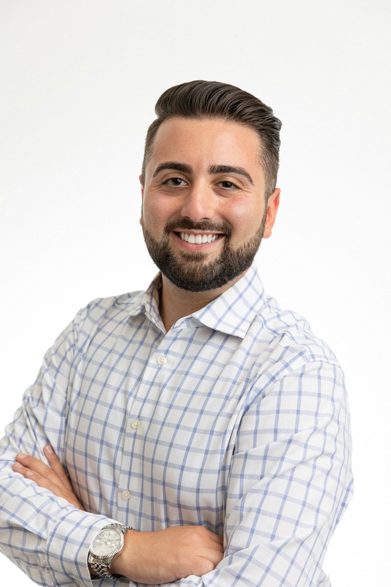 Professional business headshot in a Manhattan office