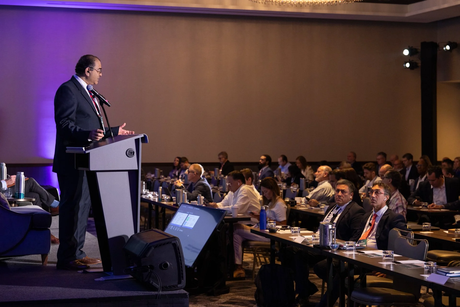 Guy speaking to crowd