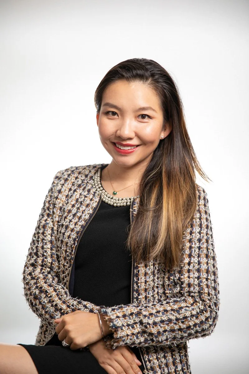 Professional corporate headshot of a woman executive photographed in New York City