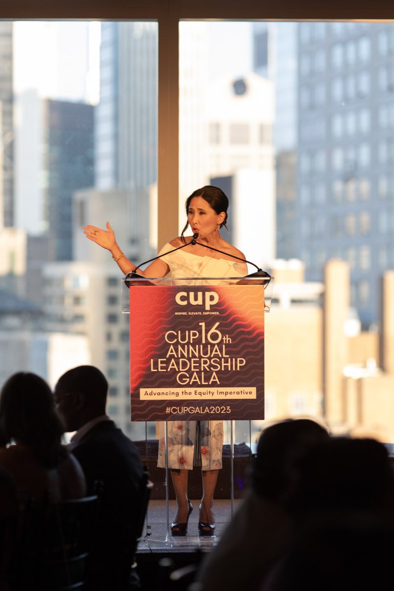 Female speaker addressing the audience at the CUP Gala at Mandarin Oriental in Manhattan