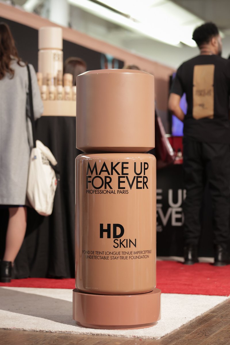 Make Up For Ever HD Skin foundation bottle displayed at The Makeup Show beauty trade show.