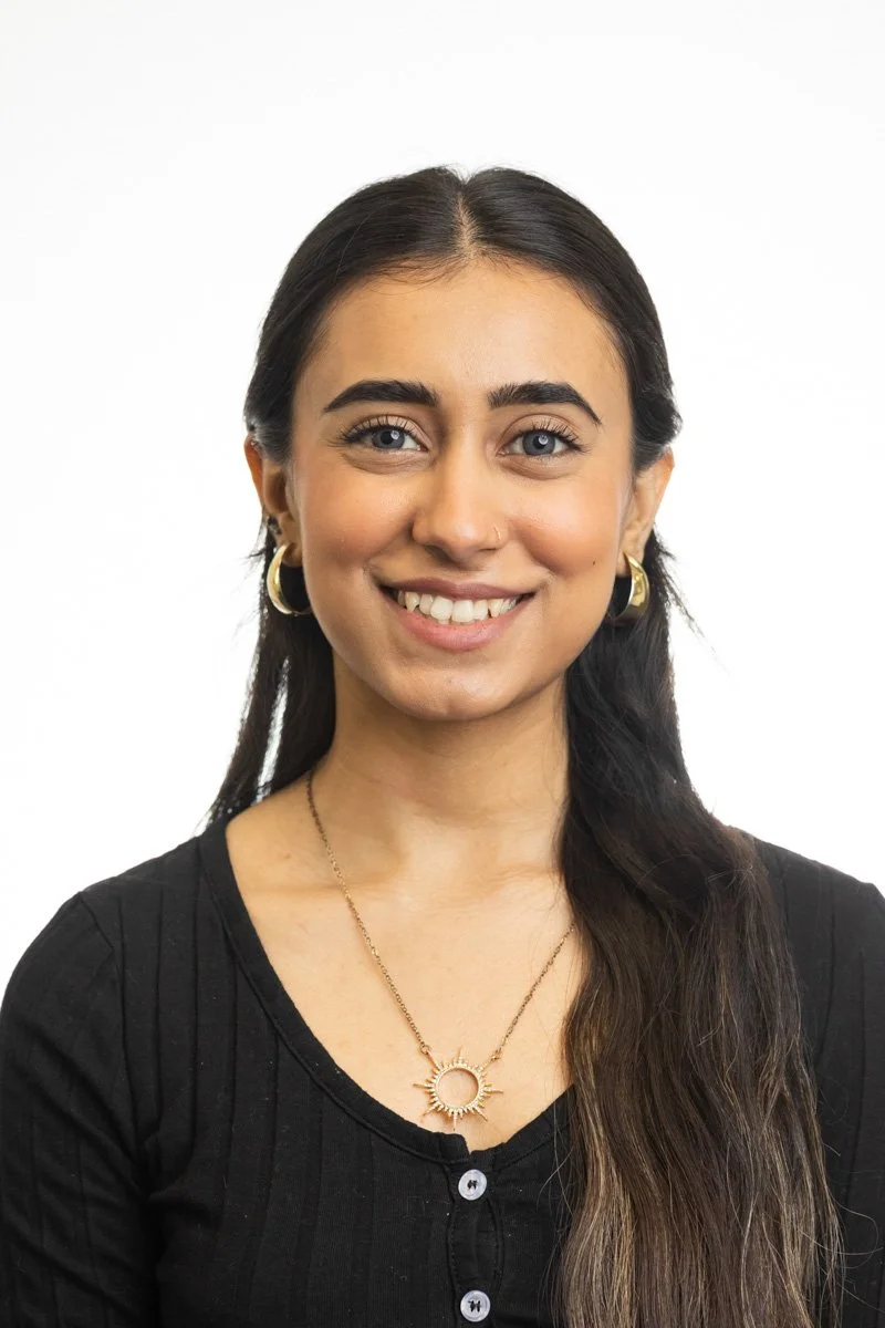 Corporate staff headshot of a woman photographed on location in NYC