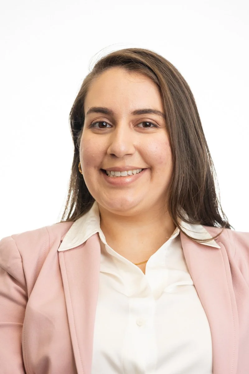 Professional corporate headshot of a woman executive photographed in New York City