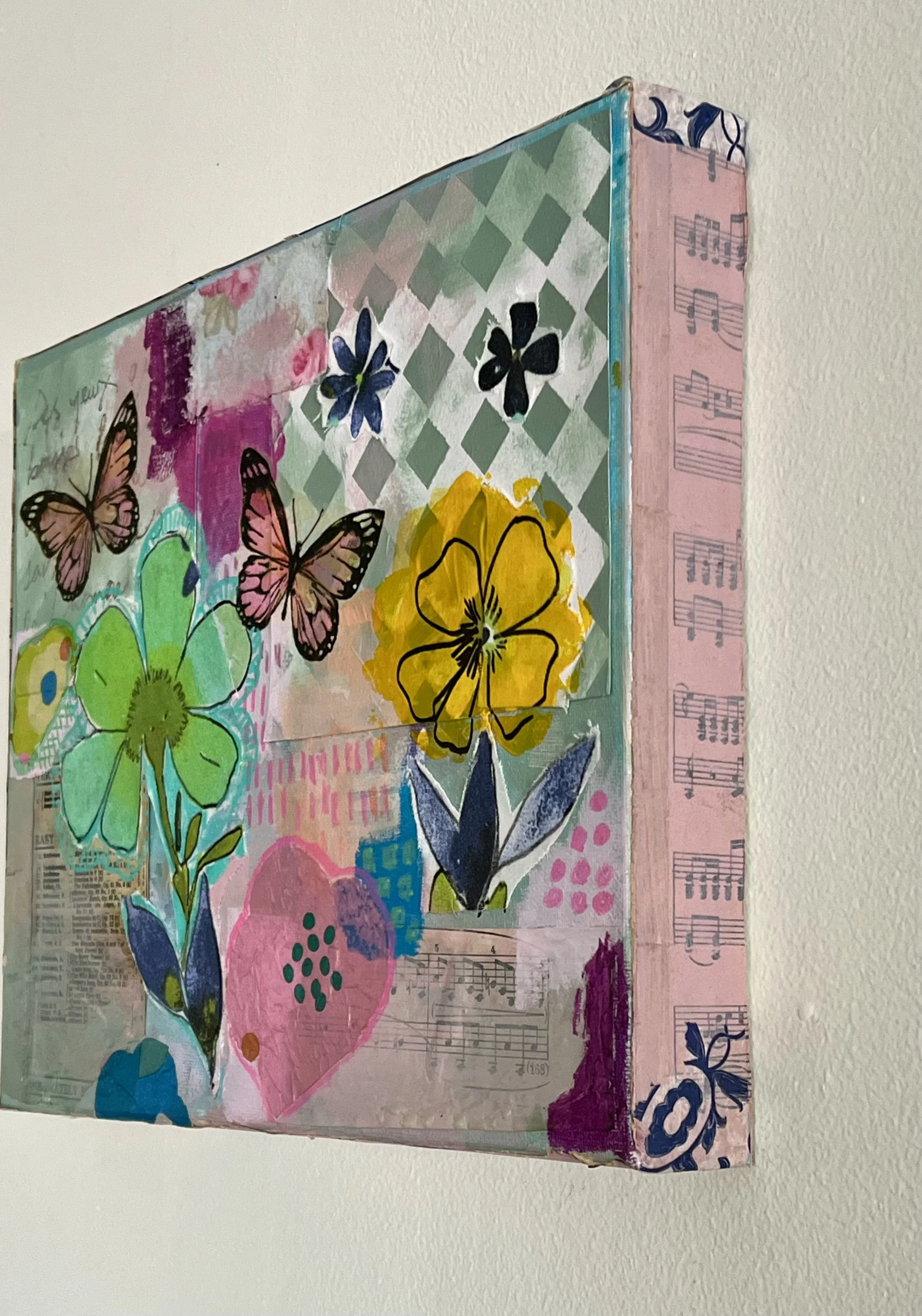 View of paintings hanging