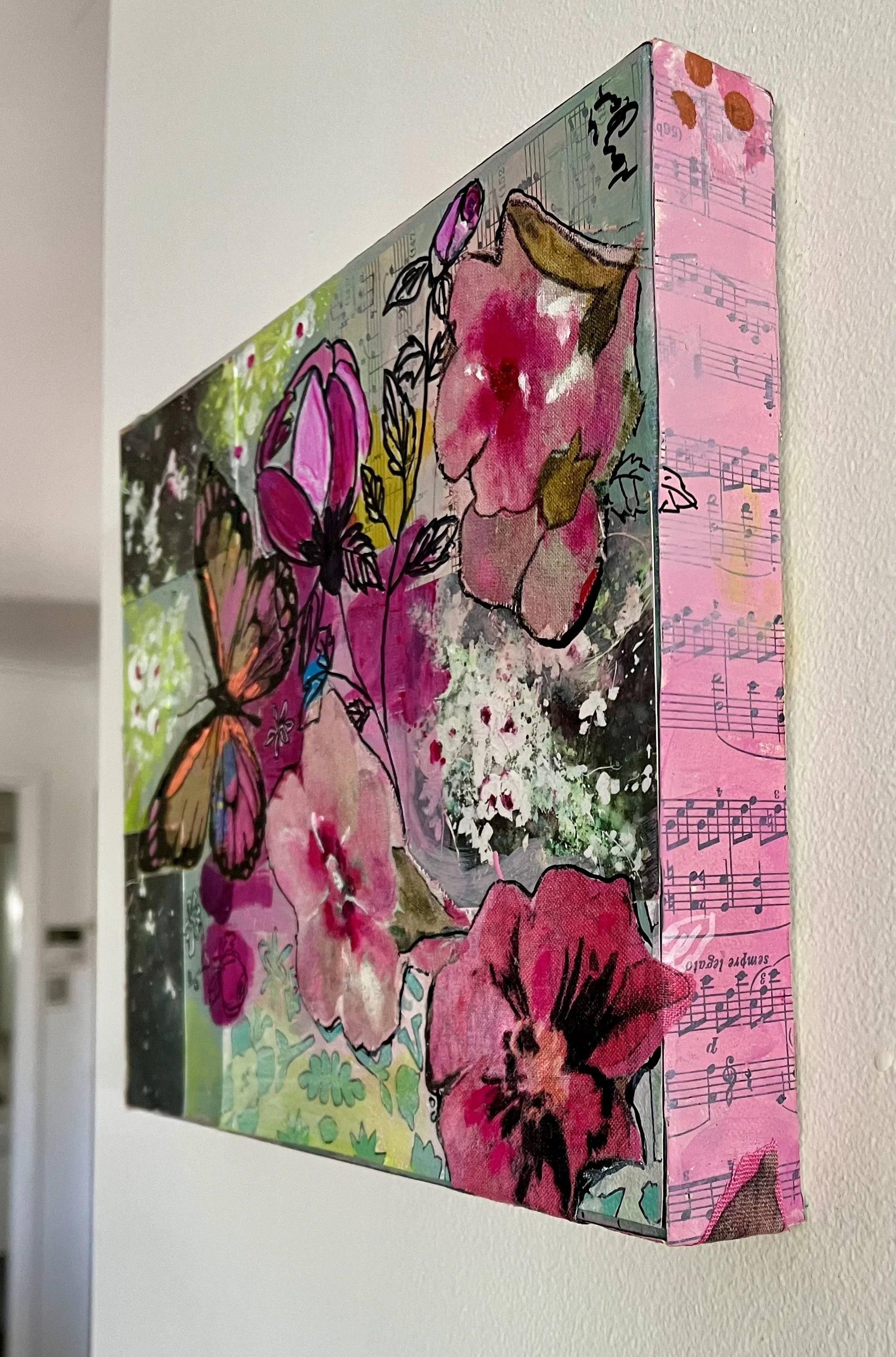 View of the paintings hanging