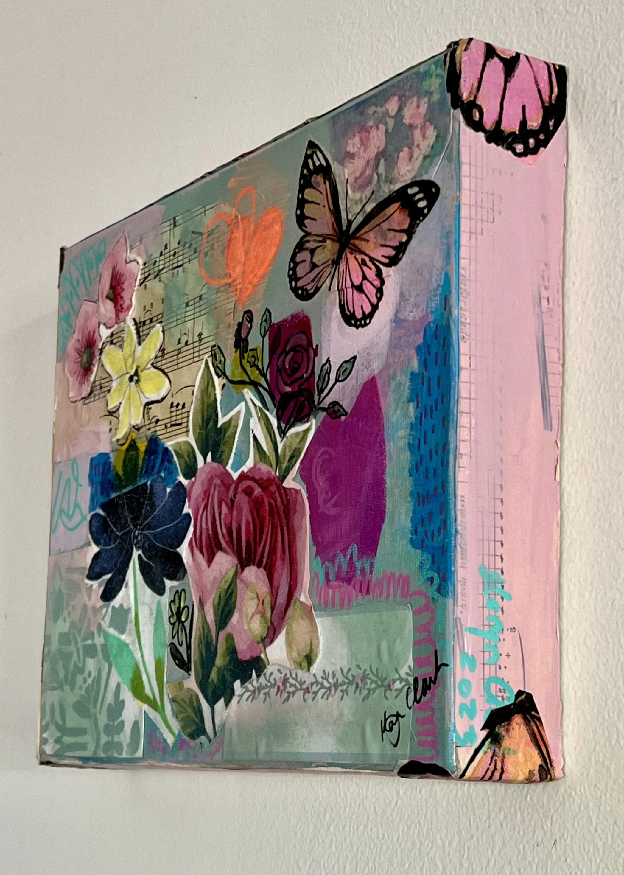View of paintings hanging