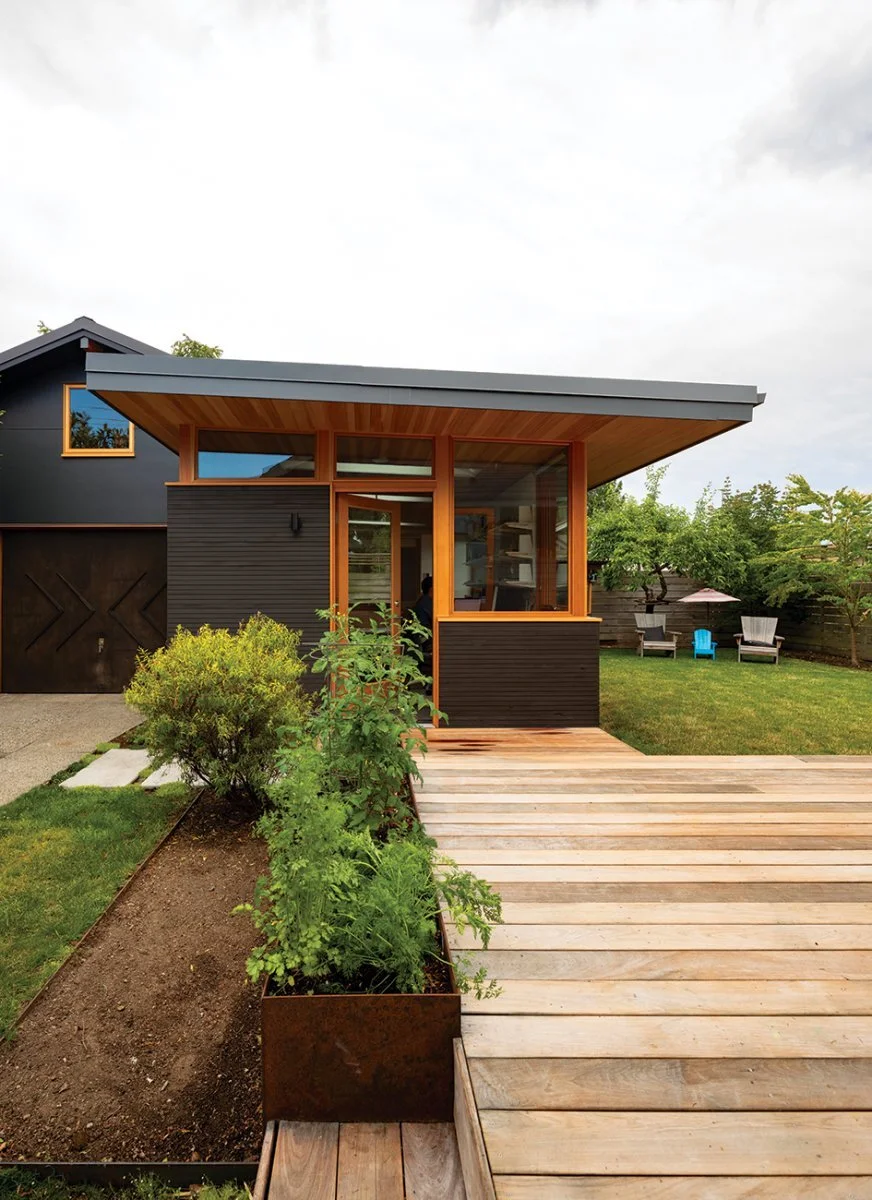 Image Credit: Alex CrookDesign Element | The former garage is now a workshop while the new office sits in a space that was once a carport.