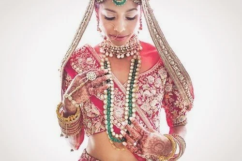 Portrait of bride Varsha sharing her testimonial about her destination Indian wedding at The Breakers in Palm Beach