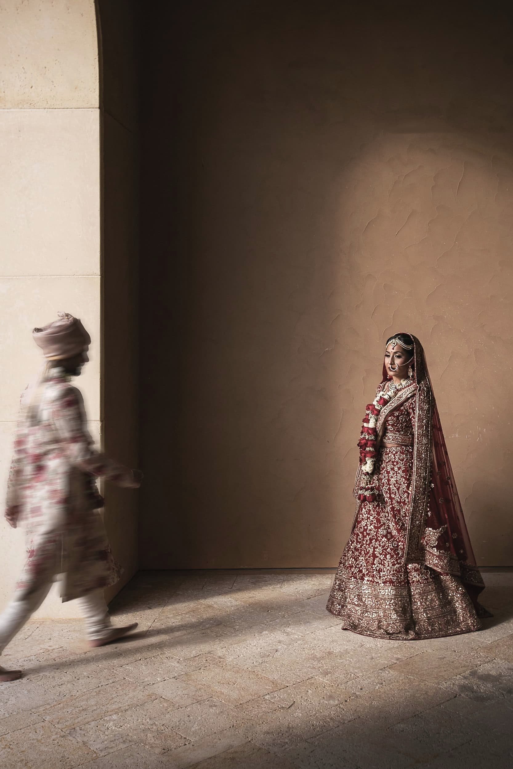 Fine-art wedding portrait of refined Indian couple naturally connecting at Four Seasons Orlando